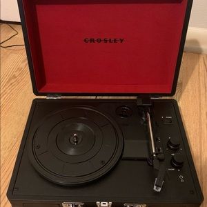 I am selling a black and red record player that has only been used 5 times.